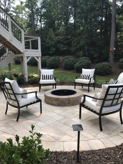 Stonehurst pavers in Sand Dune color with Grand Fire pit in Santa Fe color